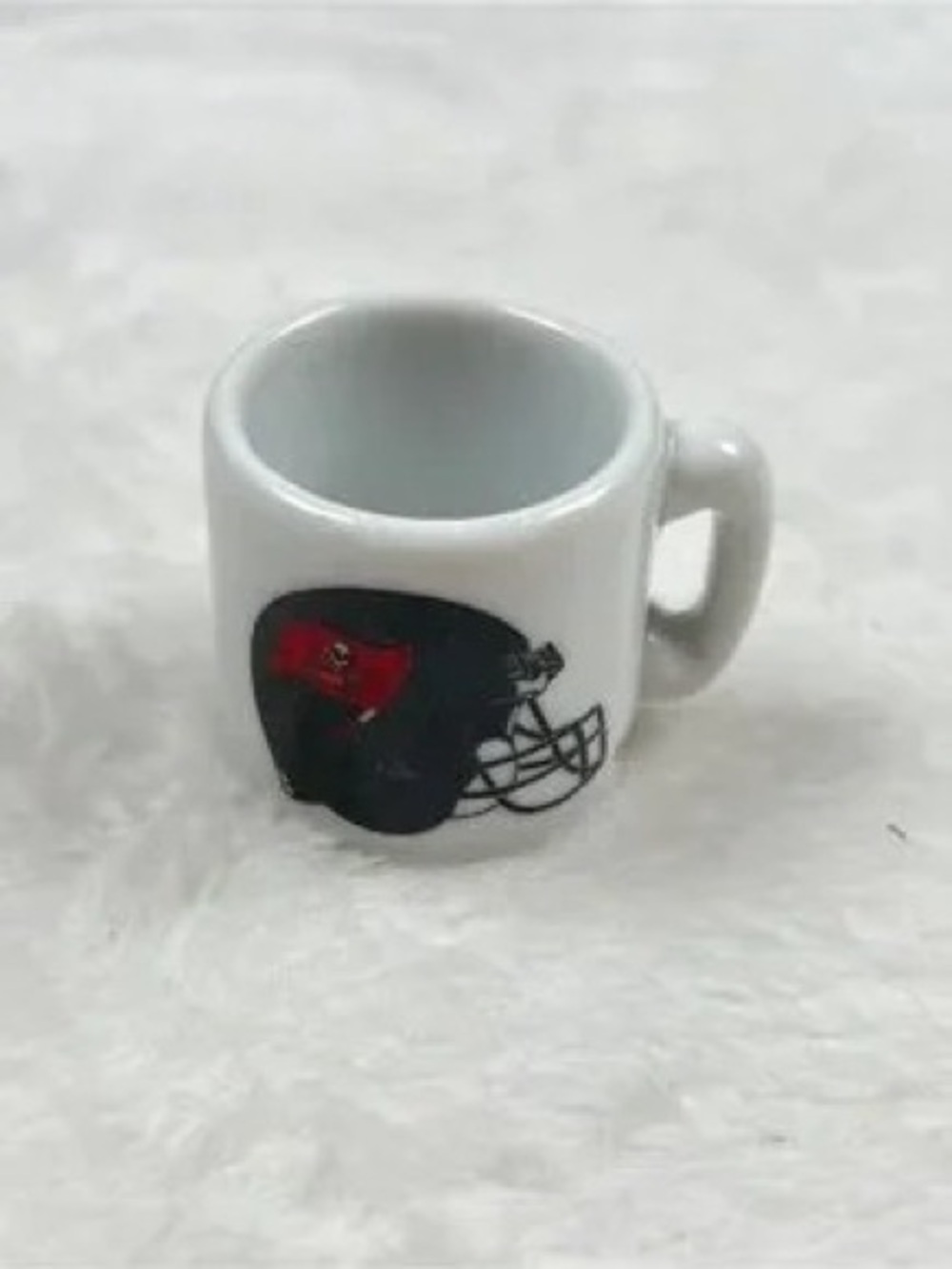 White Holiday Accent Mug Pillow with Black and Red Helmet Graphic